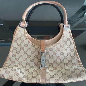 Authenic Vintage Gucci purse. Some wear and tear visible